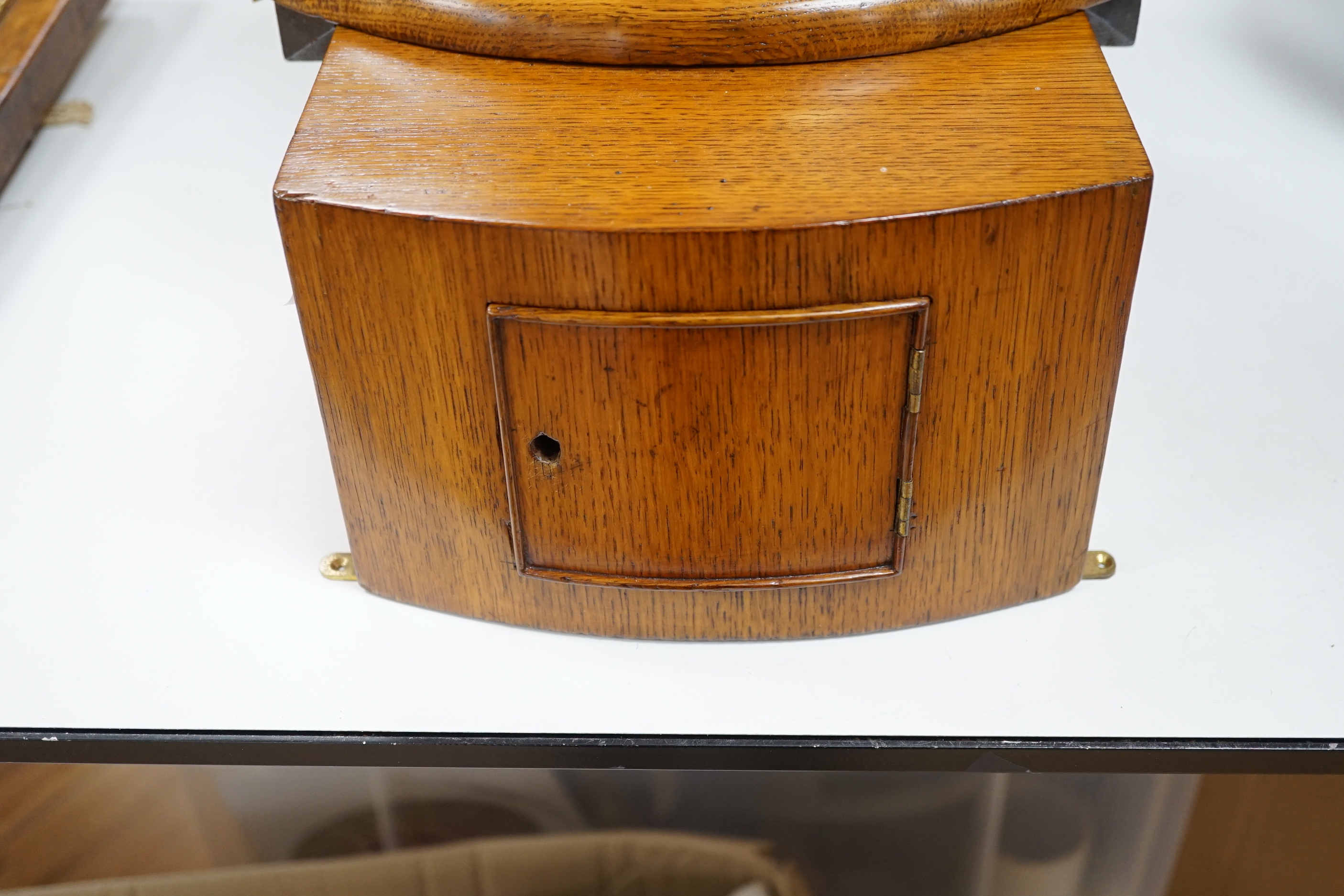 Thwaites and Reed. A Victorian oak drop dial wall clock the twin fusee movement striking on a bell, 44cm high